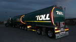 Reflective Tape on a Toll Liquids Tanker At Night